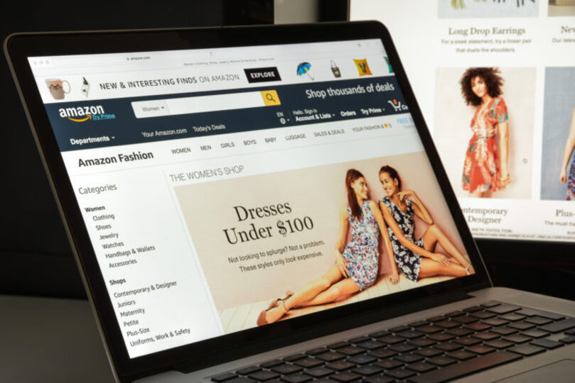 Amazon website clothing page on apple laptop