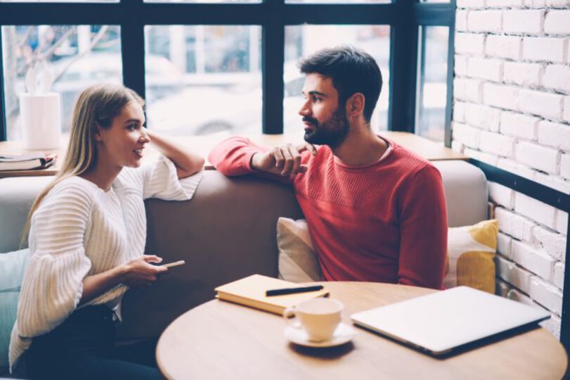 Couple having a conversation in the coffee shop