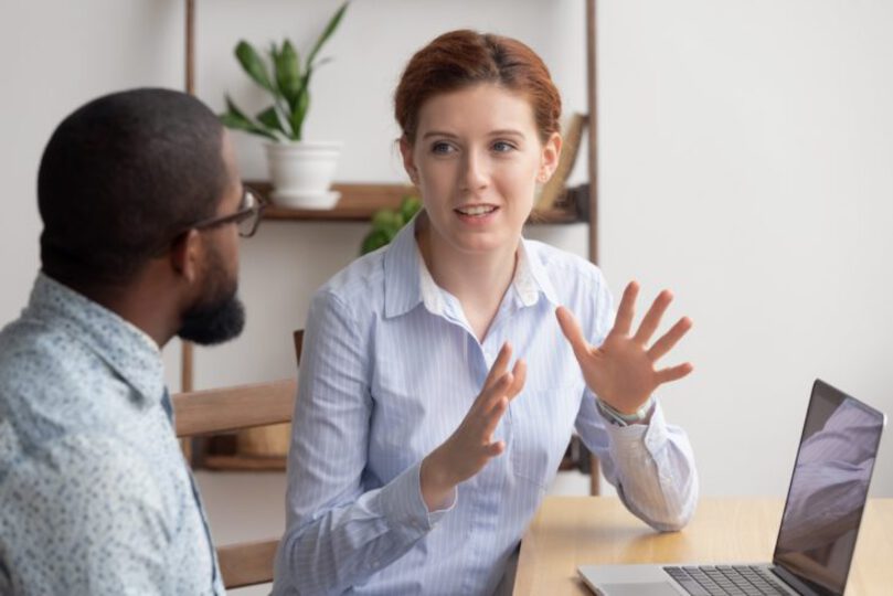 Shot of two people talking