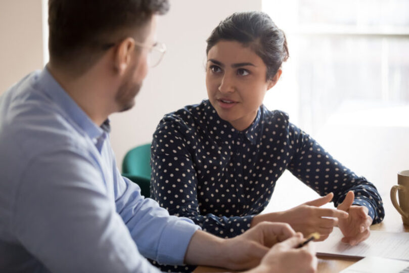 Shot of two people talking