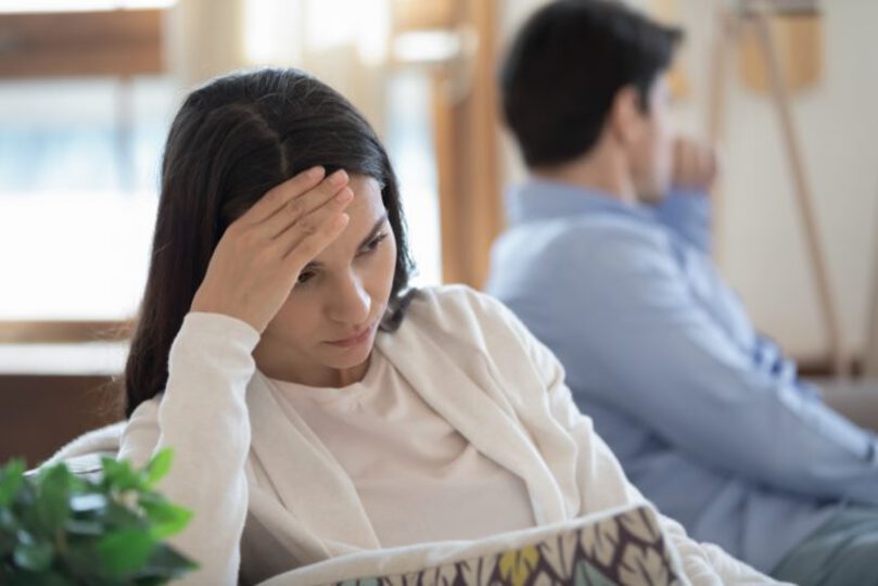 Couple being upset and ignoring each other