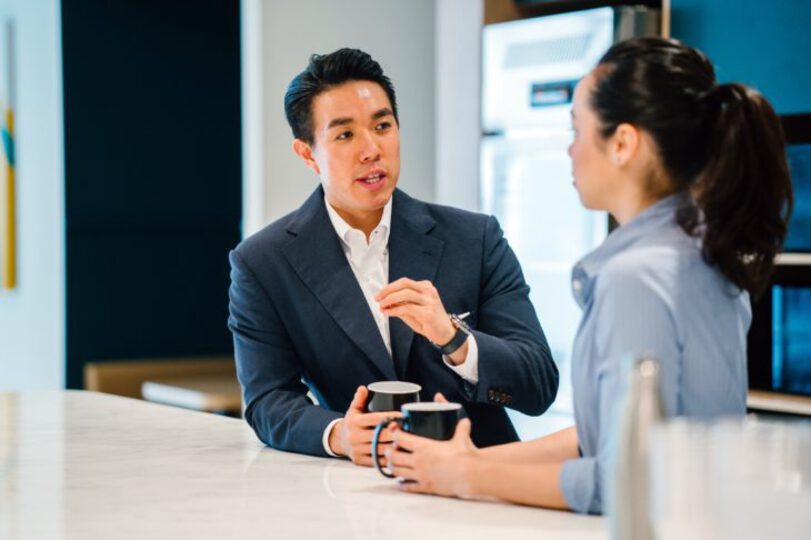 Shot of two people talking