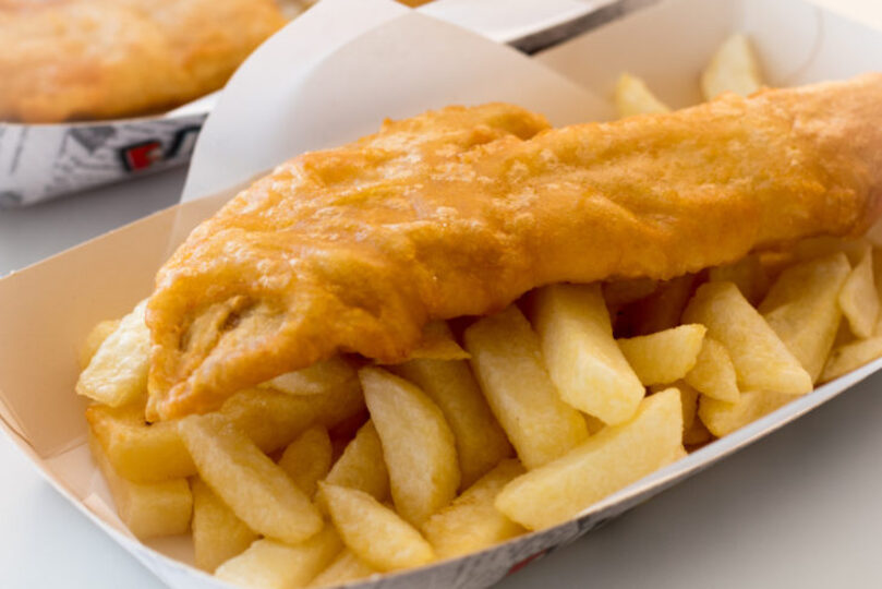 Fish and chips in a paper bowl