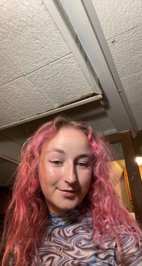 Pink Hair and blue swirly shirt