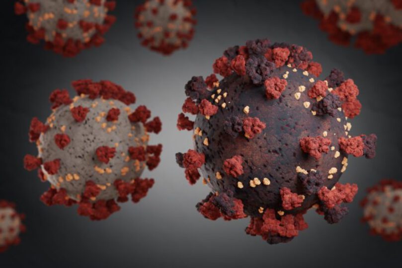Dark-colored illustration of coronavirus cell