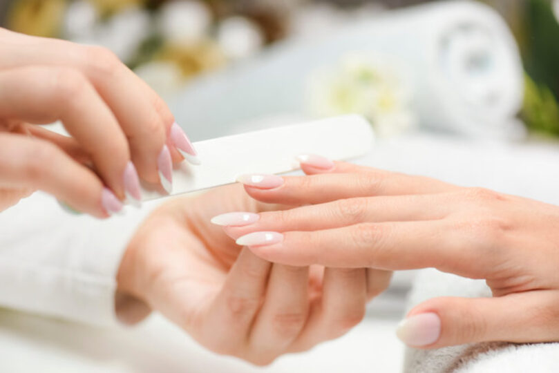 Nails getting filed 