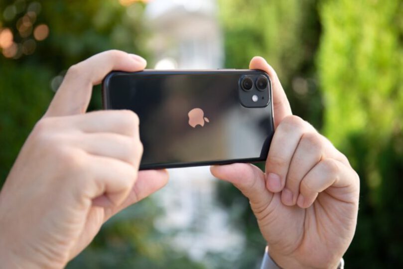 Someone holding up an iPhone